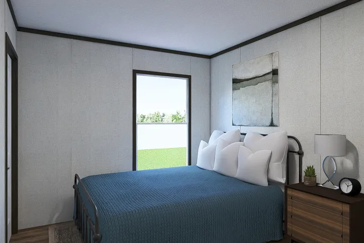 The OCCASION Guest Bedroom. This Manufactured Mobile Home features 4 bedrooms and 2 baths.