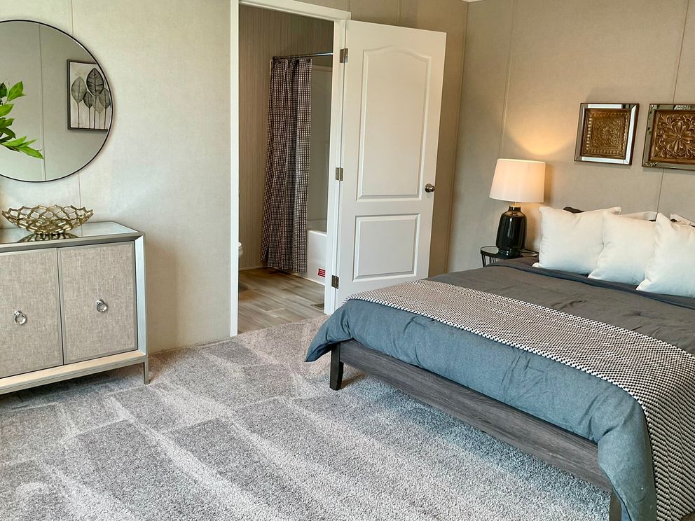 The PERIDOT 66 Primary Bedroom.