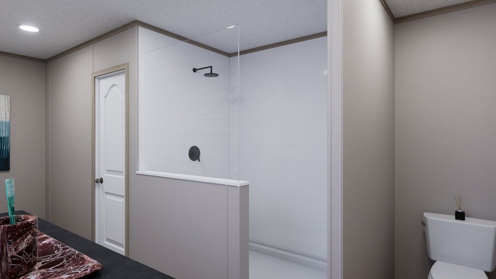 The MOUNTAIN BREEZE 3260 Primary Bathroom. This Manufactured Mobile Home features 3 bedrooms and 2 baths.