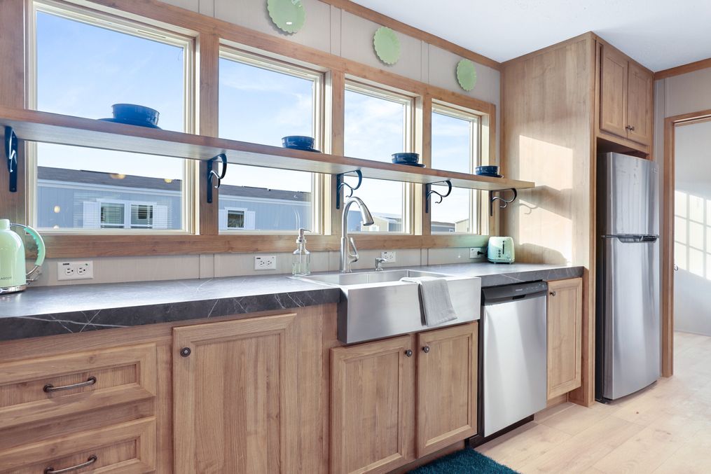 The BLUEBONNET BREEZE Kitchen. This Manufactured Mobile Home features 3 bedrooms and 2 baths.