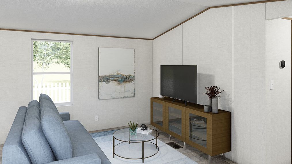 The DELIGHT Living Room. This Manufactured Mobile Home features 2 bedrooms and 2 baths.