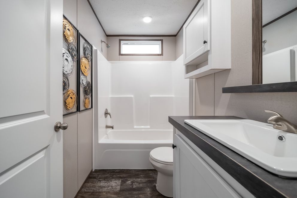 The THE GENERAL Exterior. This Manufactured Mobile Home features 3 bedrooms and 2 baths.