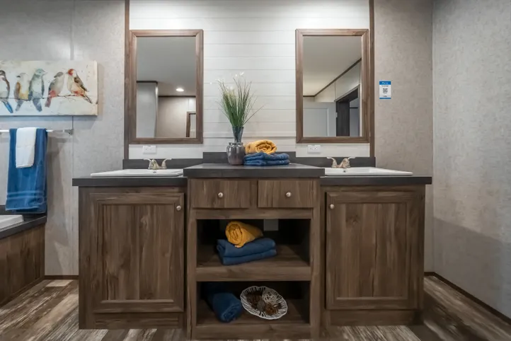 The LOCKLEAR Exterior. This Manufactured Mobile Home features 4 bedrooms and 2 baths.