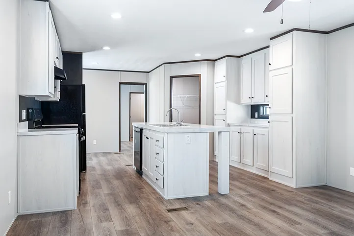 The SELECT 16723B Kitchen. This Manufactured Mobile Home features 3 bedrooms and 2 baths.