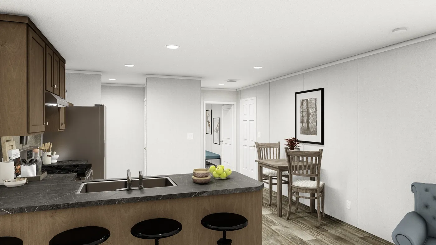 The AMBER Dining Area. This Manufactured Mobile Home features 3 bedrooms and 2 baths.