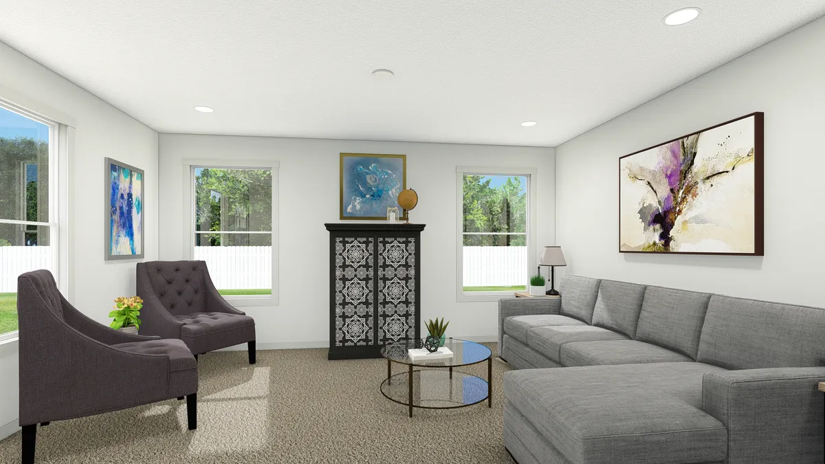 The ABBEY ROAD Living Room. This Manufactured Mobile Home features 3 bedrooms and 2 baths.
