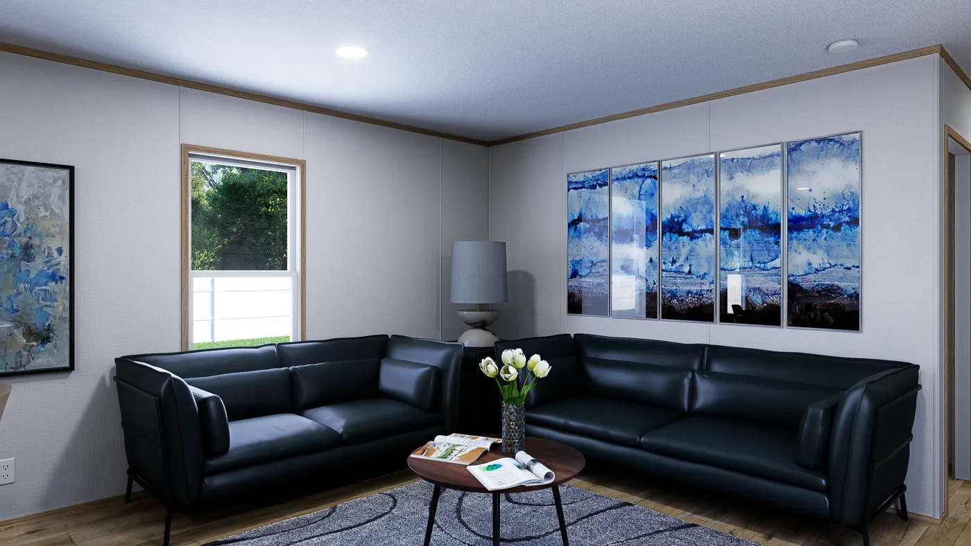 The OASIS Living Room. This Manufactured Mobile Home features 3 bedrooms and 2 baths.