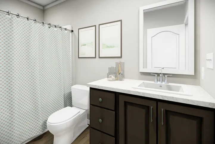 The HUXTON II Guest Bathroom. This Manufactured Mobile Home features 4 bedrooms and 2 baths.