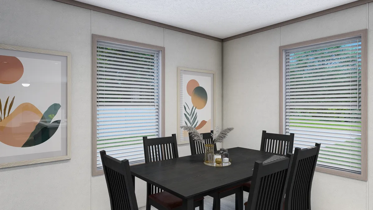 The 4828-E782 THE PULSE Dining Room. This Manufactured Mobile Home features 3 bedrooms and 2 baths.