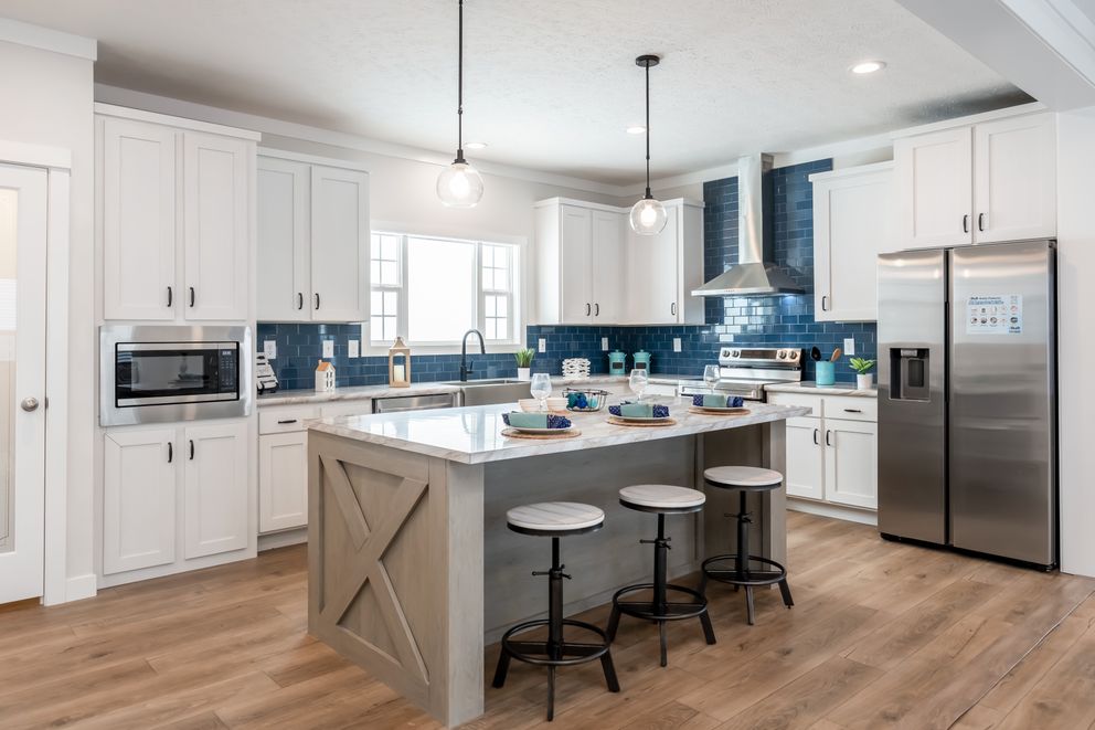 The 3459 HUD 64X28 CAROLINA Kitchen. This Manufactured Mobile Home features 3 bedrooms and 2 baths.