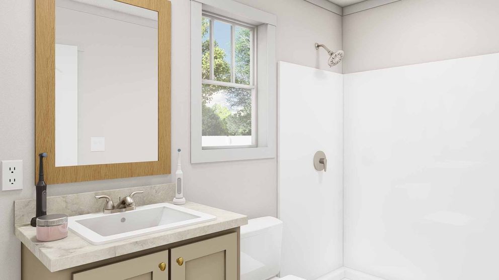 The RESPECT Primary Bathroom. This Manufactured Mobile Home features 2 bedrooms and 2 baths.