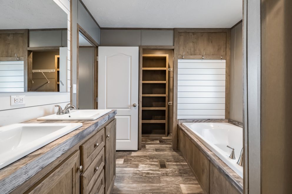 The PEYTON Exterior. This Manufactured Mobile Home features 3 bedrooms and 2 baths.