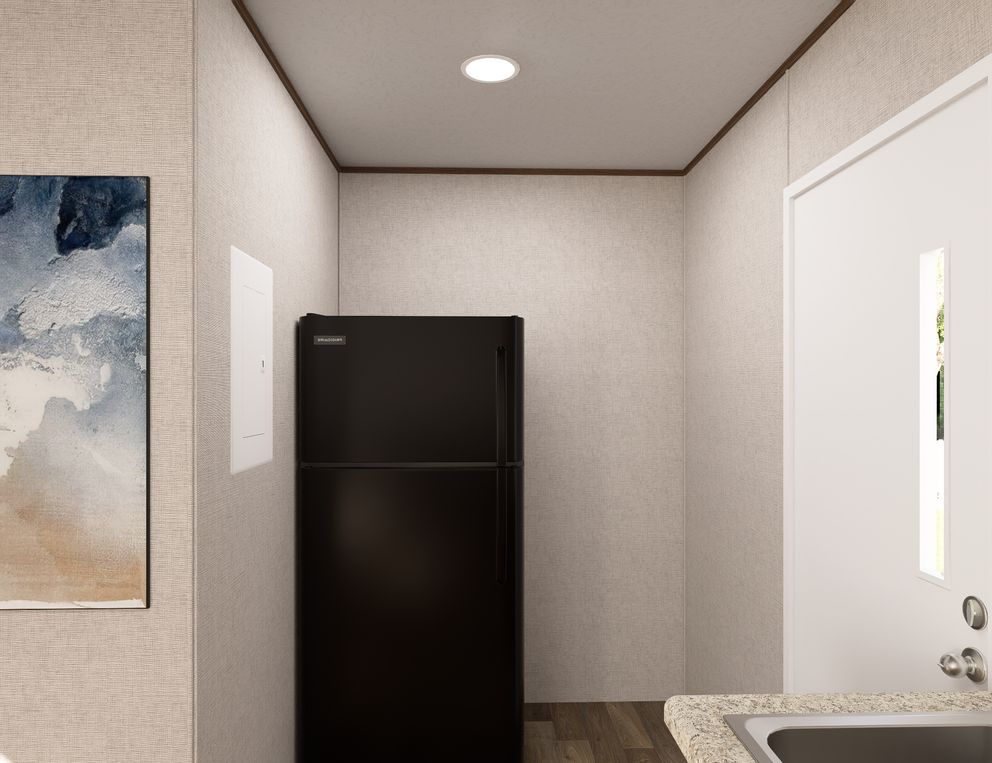 The TULIP Utility Room. This Manufactured Mobile Home features 2 bedrooms and 1 bath.