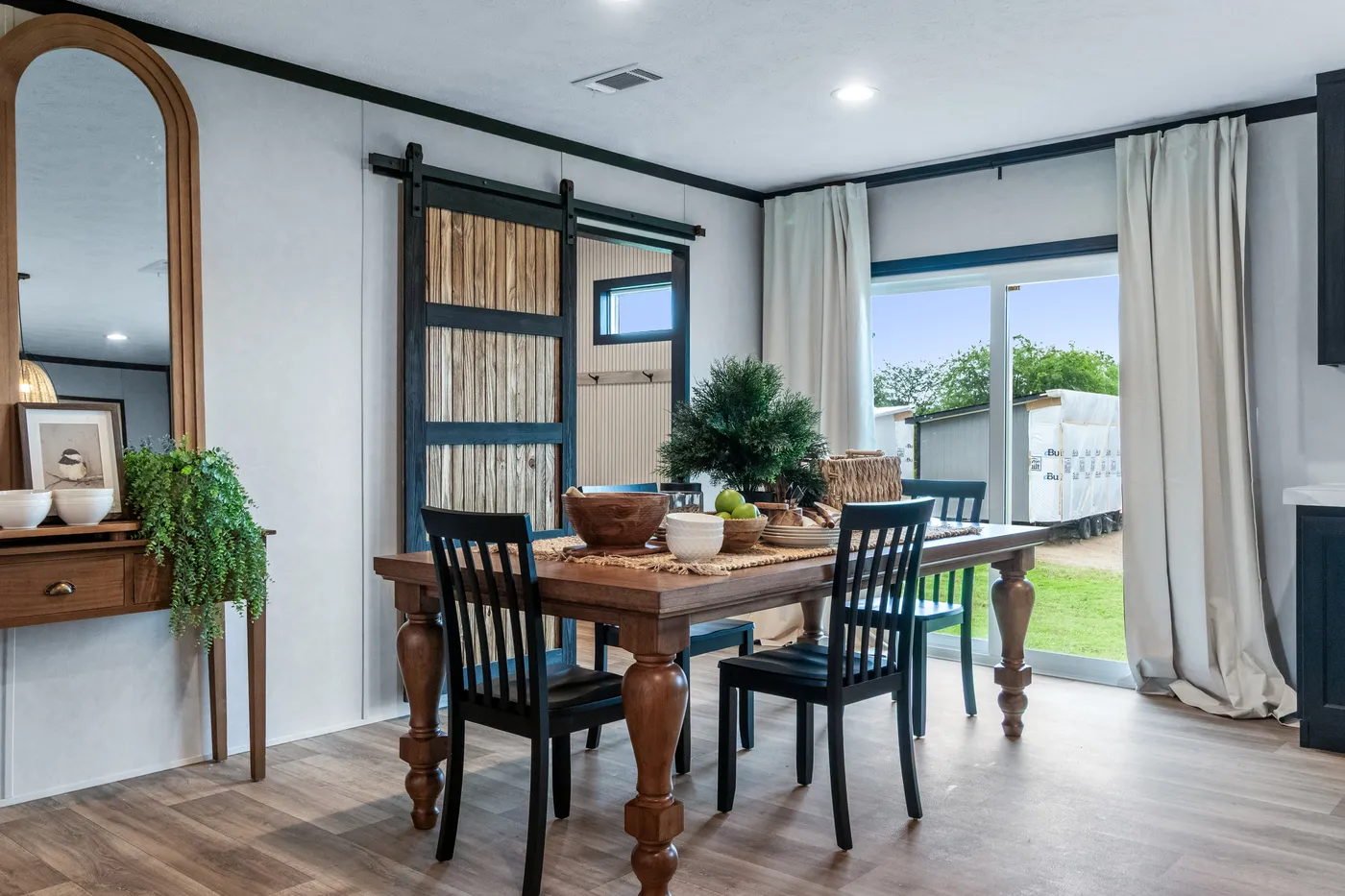 The ODYSSEY Dining Room. This Manufactured Mobile Home features 4 bedrooms and 2 baths.