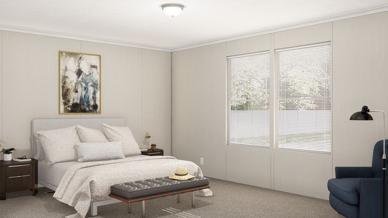 The THE RESERVE 76 Primary Bedroom. This Manufactured Mobile Home features 4 bedrooms and 2 baths.