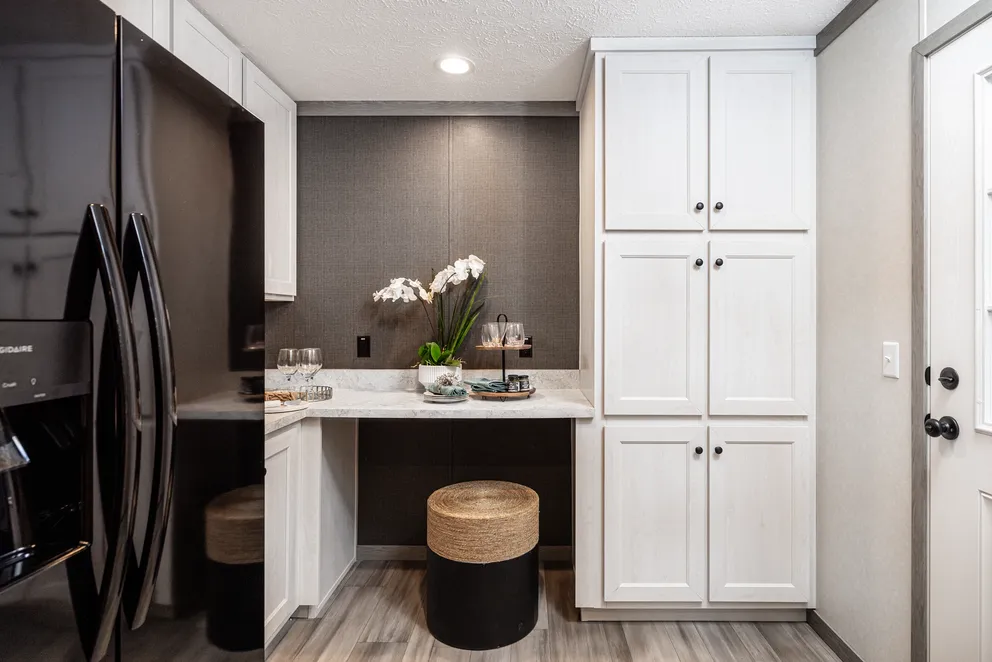 The 6428-E792 THE PULSE Kitchen. This Manufactured Mobile Home features 3 bedrooms and 2.5 baths.