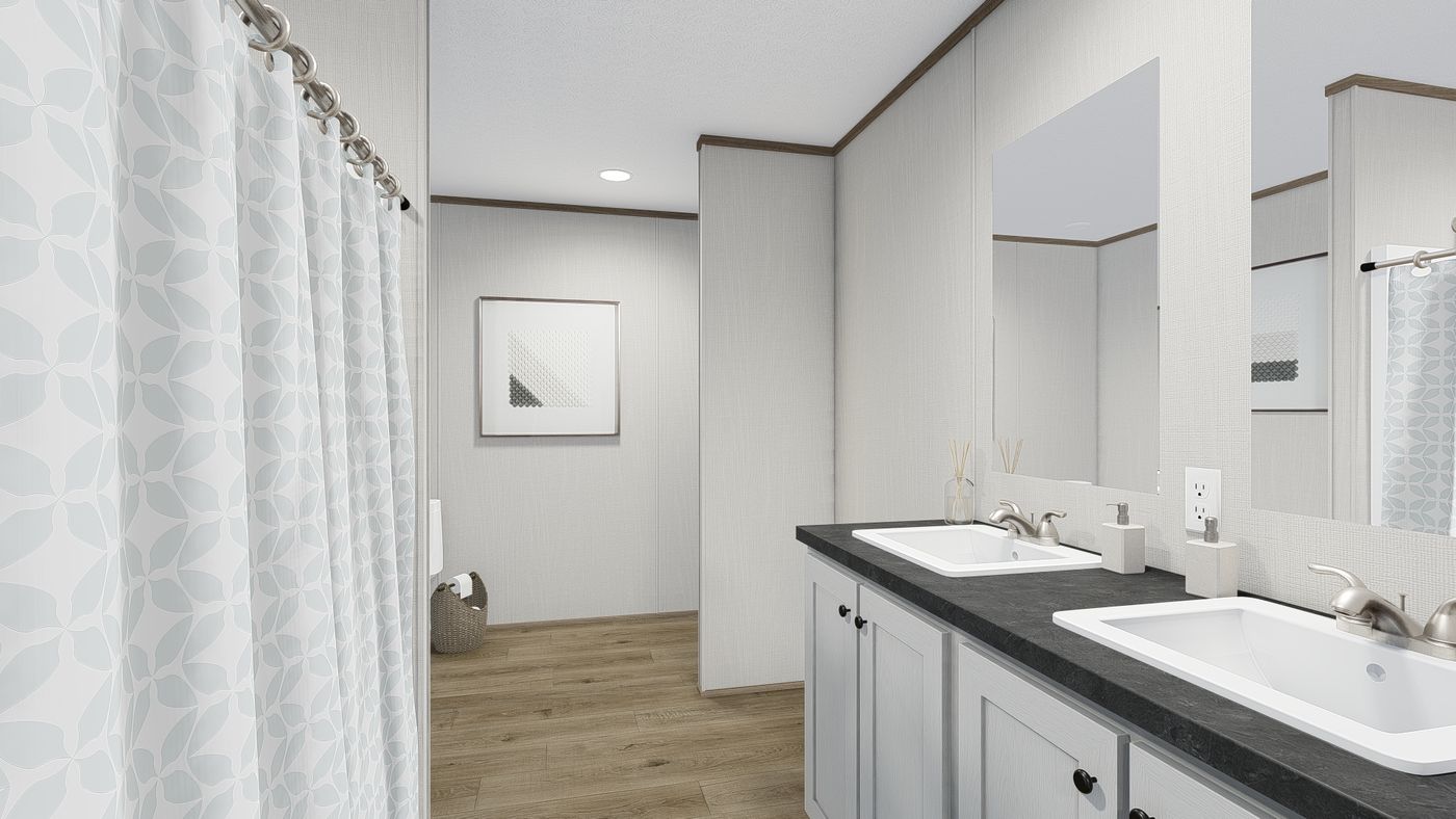 The ASPIRE Primary Bathroom. This Manufactured Mobile Home features 3 bedrooms and 2 baths.