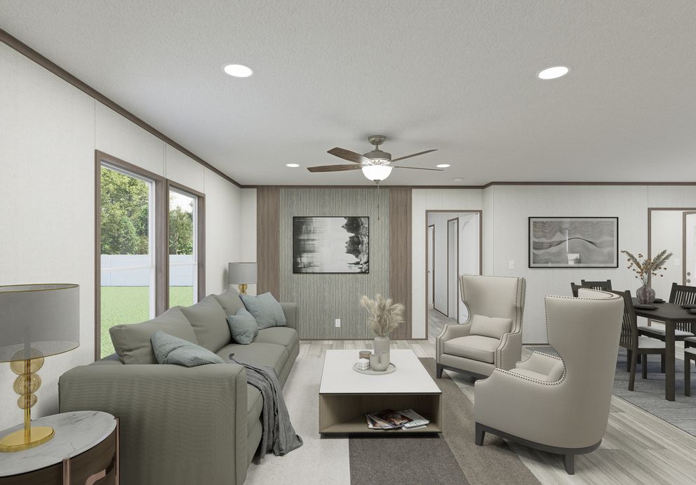 The THE MOUNTAINEER 64 Living Room. This Manufactured Mobile Home features 3 bedrooms and 2 baths.