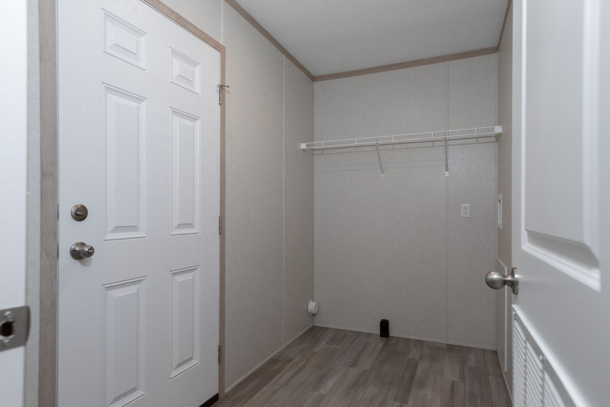 The 5628-5202 ADRENALINE Utility Room. This Manufactured Mobile Home features 3 bedrooms and 2 baths.