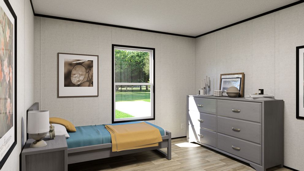 The SOLACE Guest Bedroom. This Manufactured Mobile Home features 4 bedrooms and 2 baths.