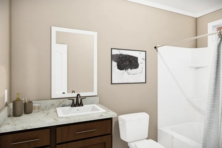The THE BRYANT Guest Bathroom. This Manufactured Mobile Home features 4 bedrooms and 2 baths.
