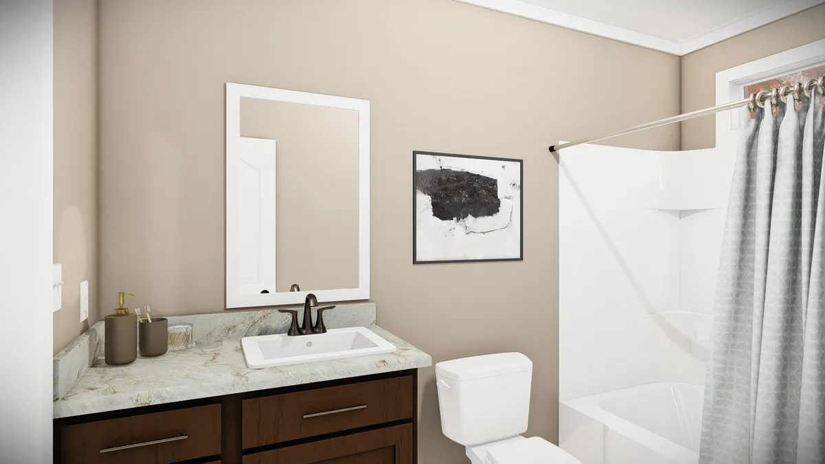 The THE BRYANT Guest Bathroom. This Manufactured Mobile Home features 4 bedrooms and 2 baths.