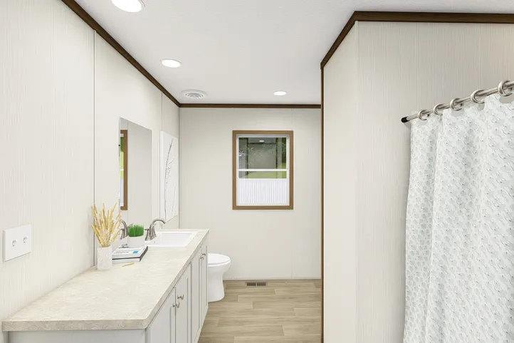 The BALANCE Primary Bathroom. This Manufactured Mobile Home features 3 bedrooms and 2 baths.