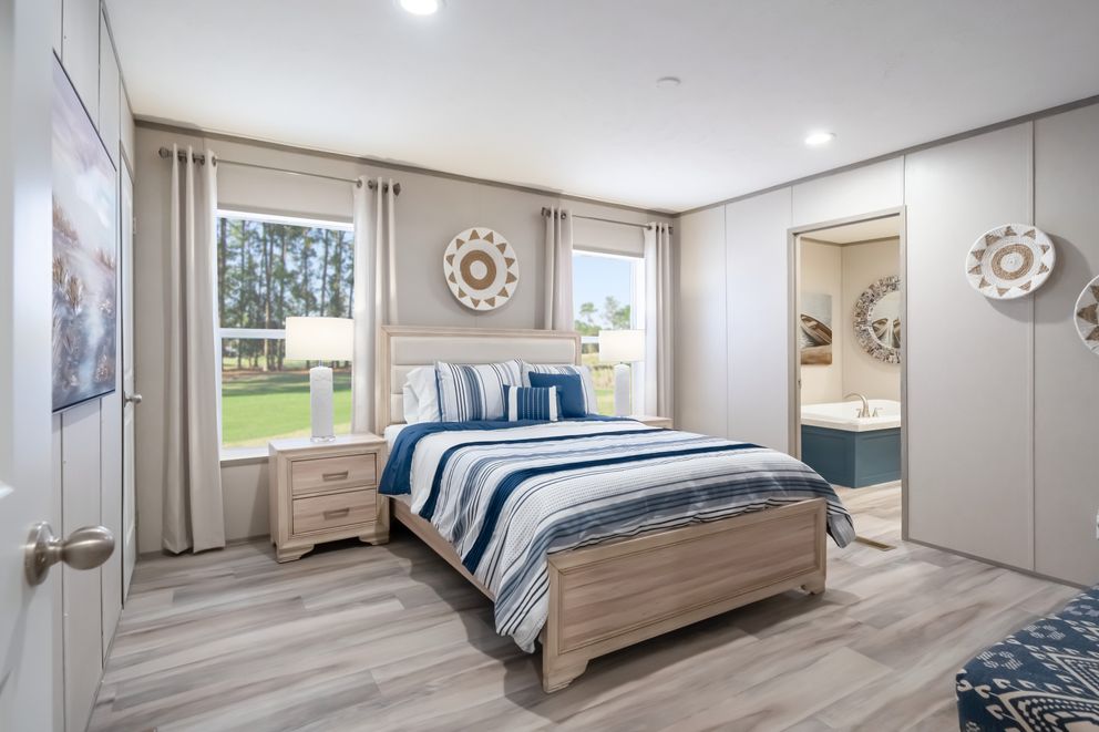 The TRADITION 48F Primary Bedroom. This Manufactured Mobile Home features 3 bedrooms and 2 baths.