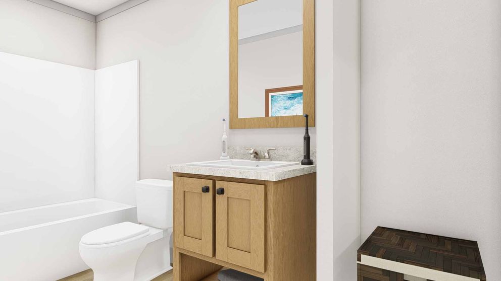 The AFRICA Guest Bathroom. This Manufactured Mobile Home features 3 bedrooms and 2 baths.