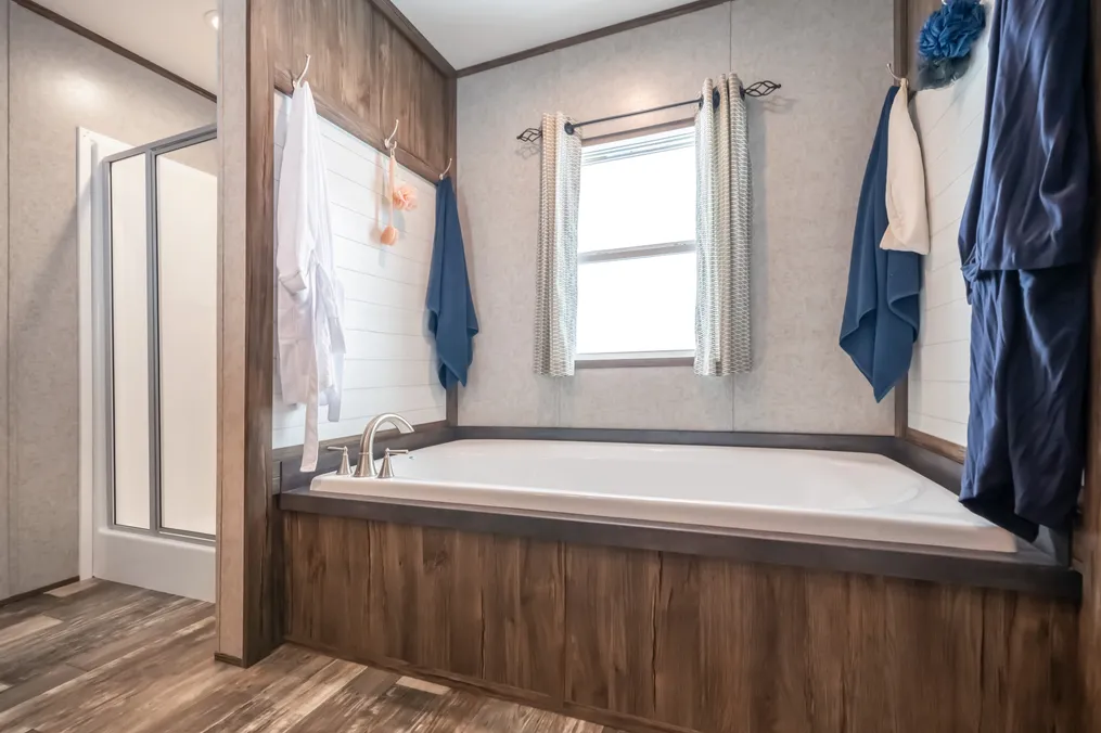 The LIBERTY Primary Bathroom. This Manufactured Mobile Home features 3 bedrooms and 2 baths.