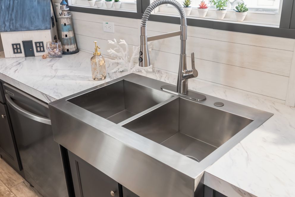 The THE DRIFTWOOD Kitchen. This Manufactured Mobile Home features 3 bedrooms and 2 baths.