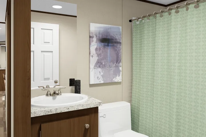 The ELATION Guest Bathroom. This Manufactured Mobile Home features 3 bedrooms and 2 baths.