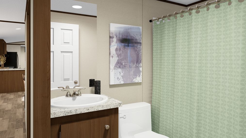 The ELATION Guest Bathroom. This Manufactured Mobile Home features 3 bedrooms and 2 baths.