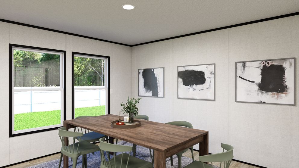 The SOLACE Dining Area. This Manufactured Mobile Home features 4 bedrooms and 2 baths.