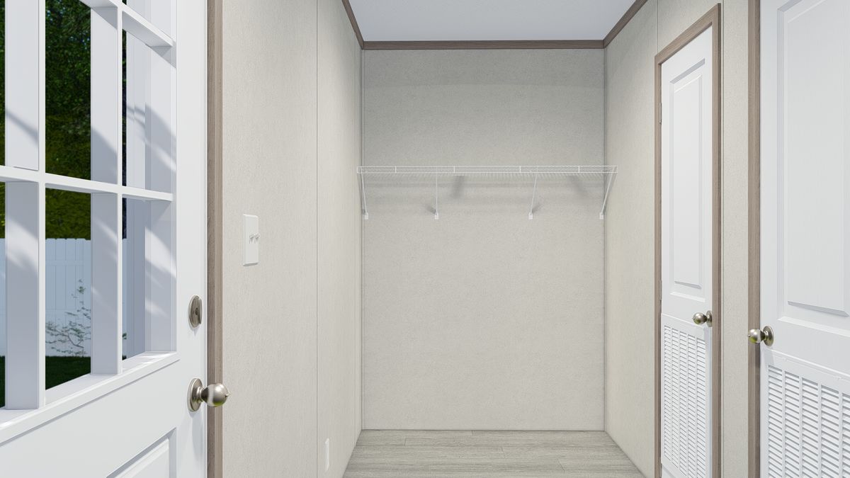 The 7228-5789 THE PULSE Utility Room. This Manufactured Mobile Home features 3 bedrooms and 2 baths.