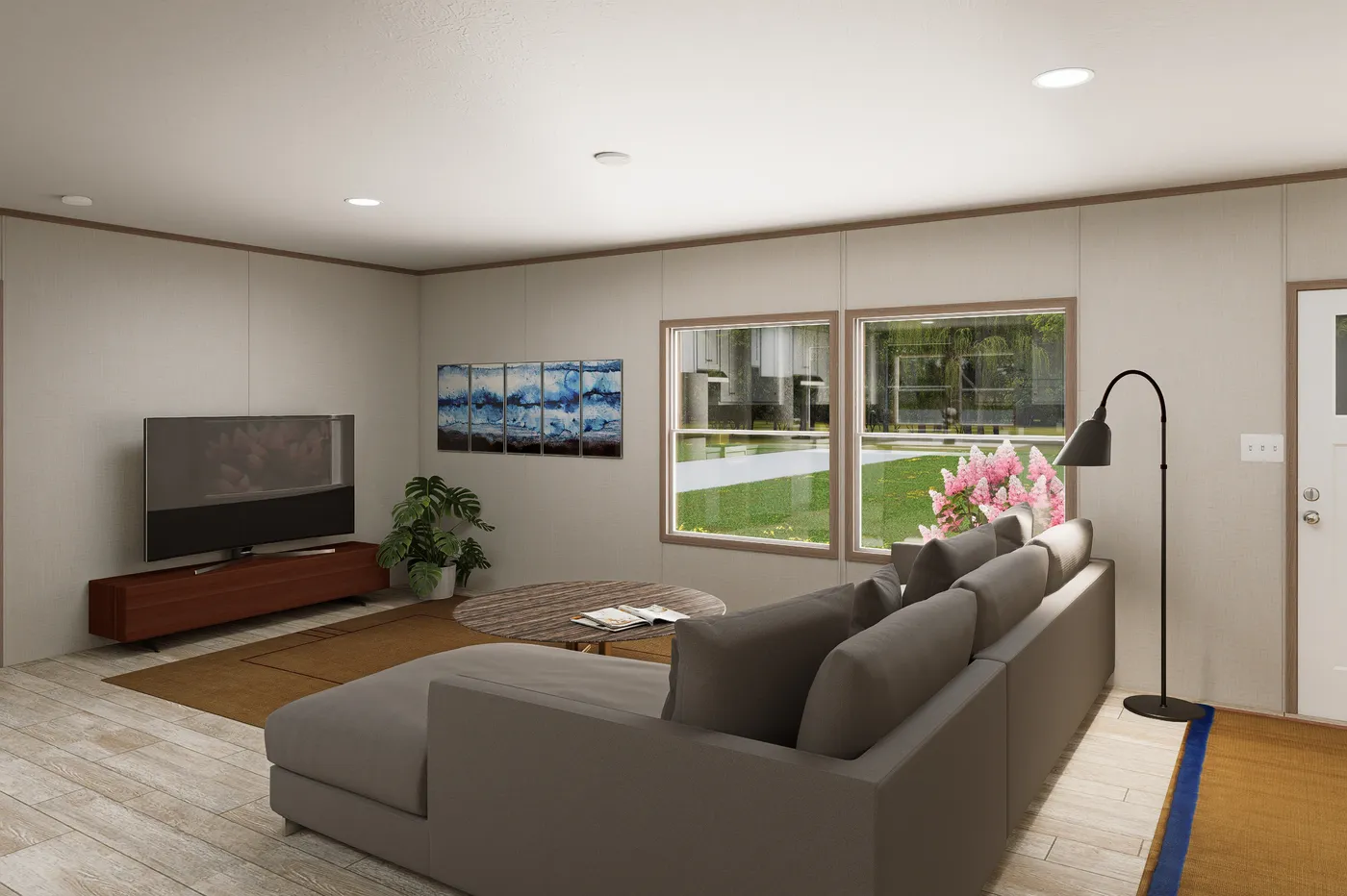 The ULTRA FLEX 76 Living Room. This Manufactured Mobile Home features 4 bedrooms and 2 baths.