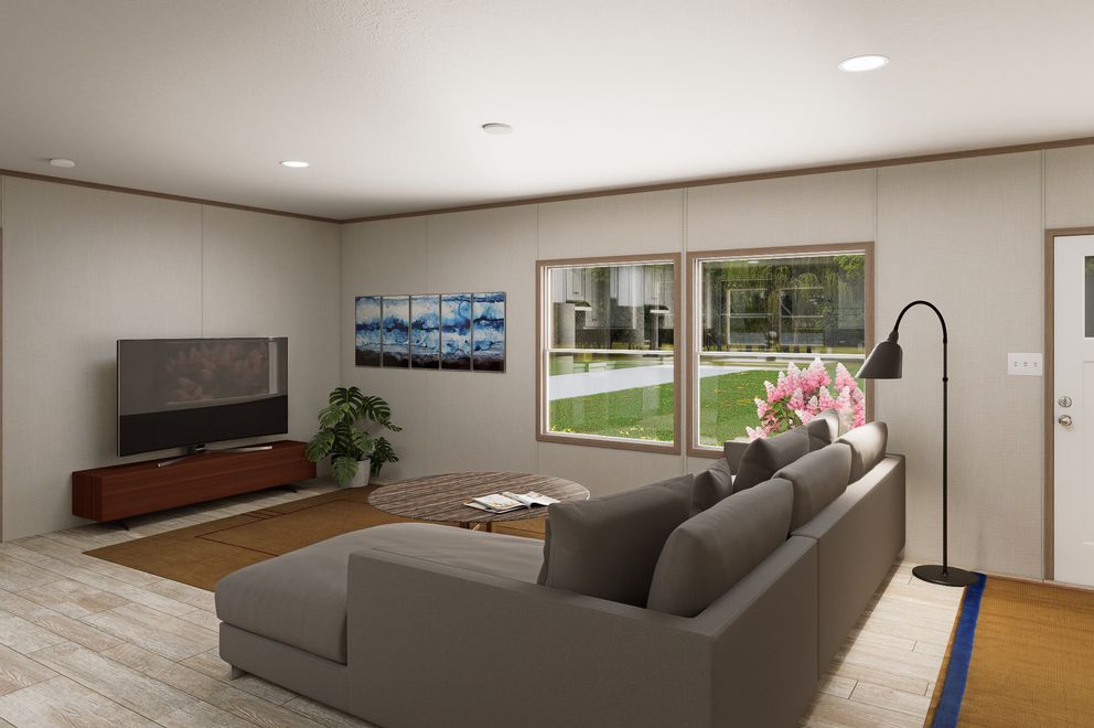 The ULTRA FLEX 76 Living Room. This Manufactured Mobile Home features 4 bedrooms and 2 baths.