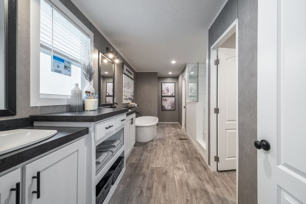 The THE FUSION 3260 Primary Bathroom. This Manufactured Mobile Home features 3 bedrooms and 2 baths.