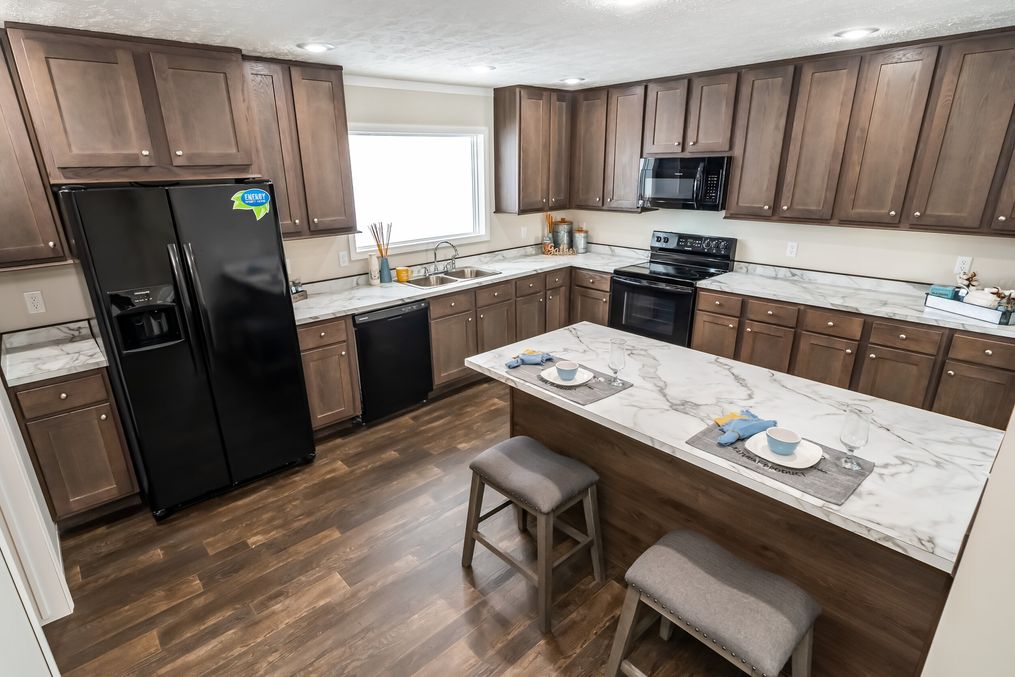 The MAVERICK 56A Kitchen. This Manufactured Mobile Home features 3 bedrooms and 2 baths.