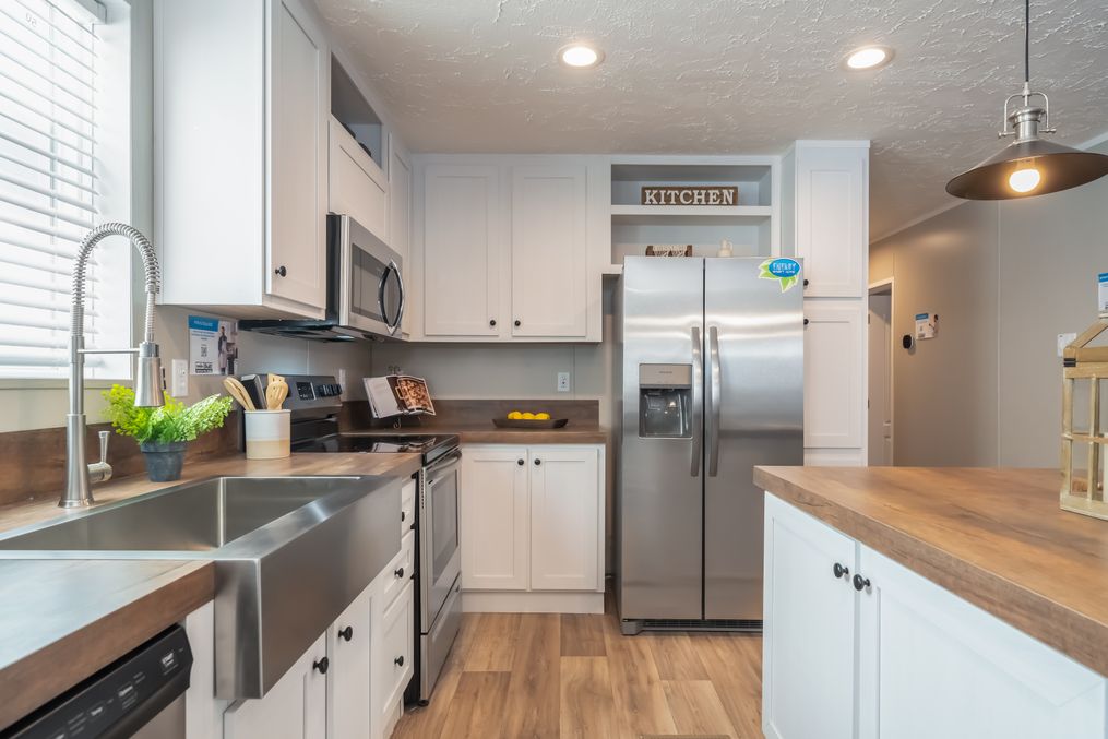 The TRADITION 2868B Kitchen. This Manufactured Mobile Home features 4 bedrooms and 2 baths.