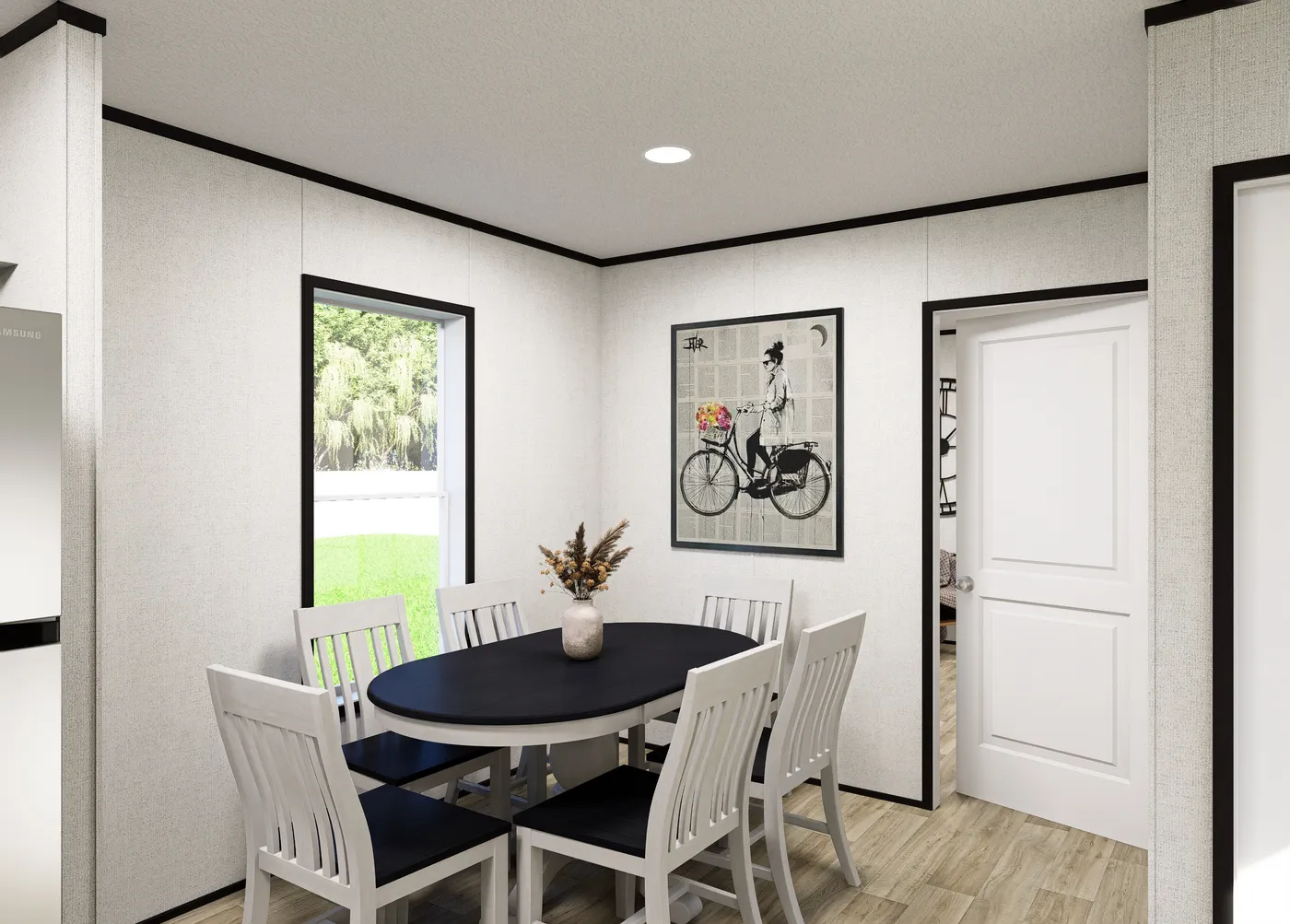 The NORTHSTAR Dining Area. This Manufactured Mobile Home features 3 bedrooms and 2 baths.