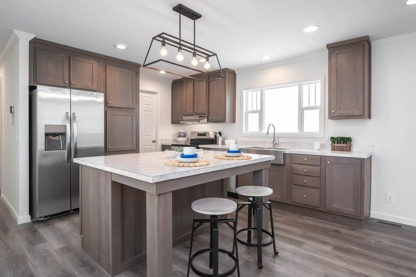 The 5406 "PINEHAVEN" 7616 Kitchen. This Manufactured Mobile Home features 3 bedrooms and 2 baths.
