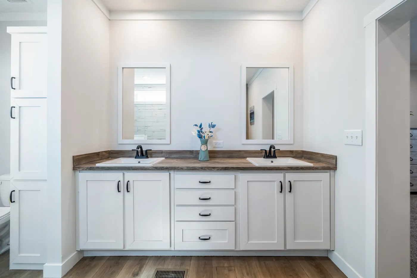The 3459 MOD 64X28 CAROLINA Primary Bathroom. This Modular Home features 3 bedrooms and 2 baths.
