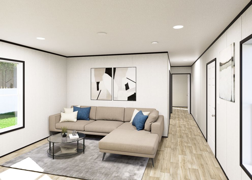 The NORTHSTAR Living Room. This Manufactured Mobile Home features 3 bedrooms and 2 baths.
