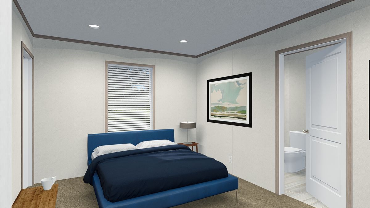 The 6616-4779 THE PULSE Primary Bedroom. This Manufactured Mobile Home features 3 bedrooms and 2 baths.