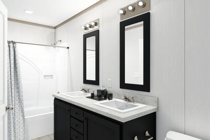 The 4828-E746 THE PULSE Primary Bathroom. This Manufactured Mobile Home features 3 bedrooms and 2 baths.
