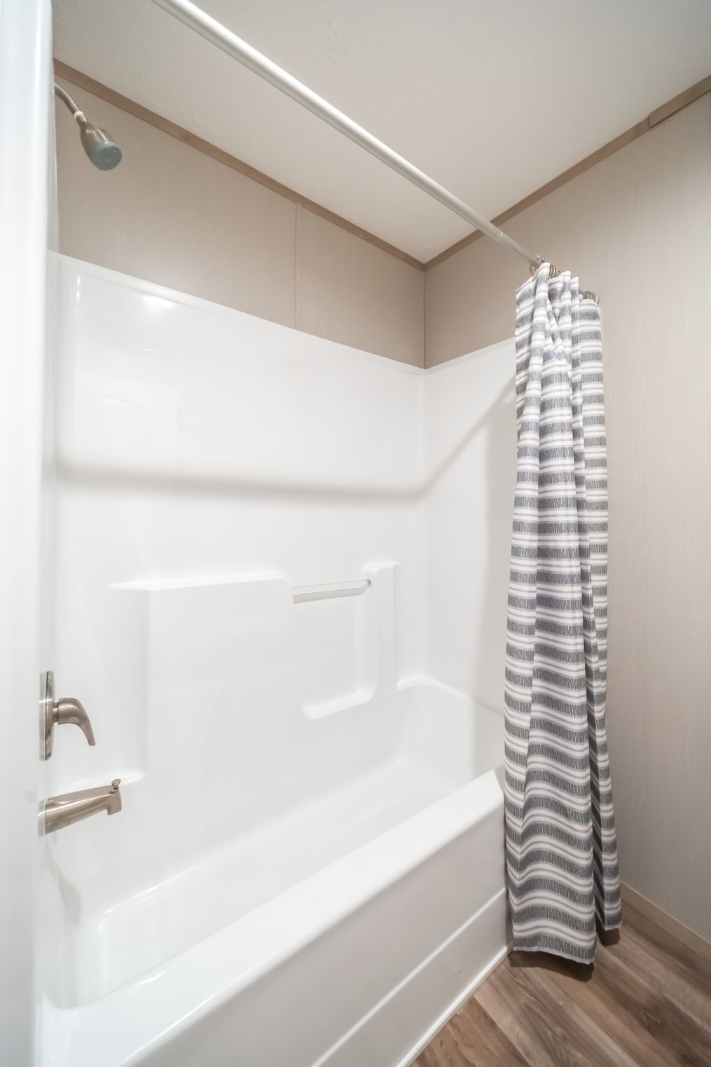 The RAINIER Guest Bathroom. This Manufactured Mobile Home features 4 bedrooms and 3 baths.