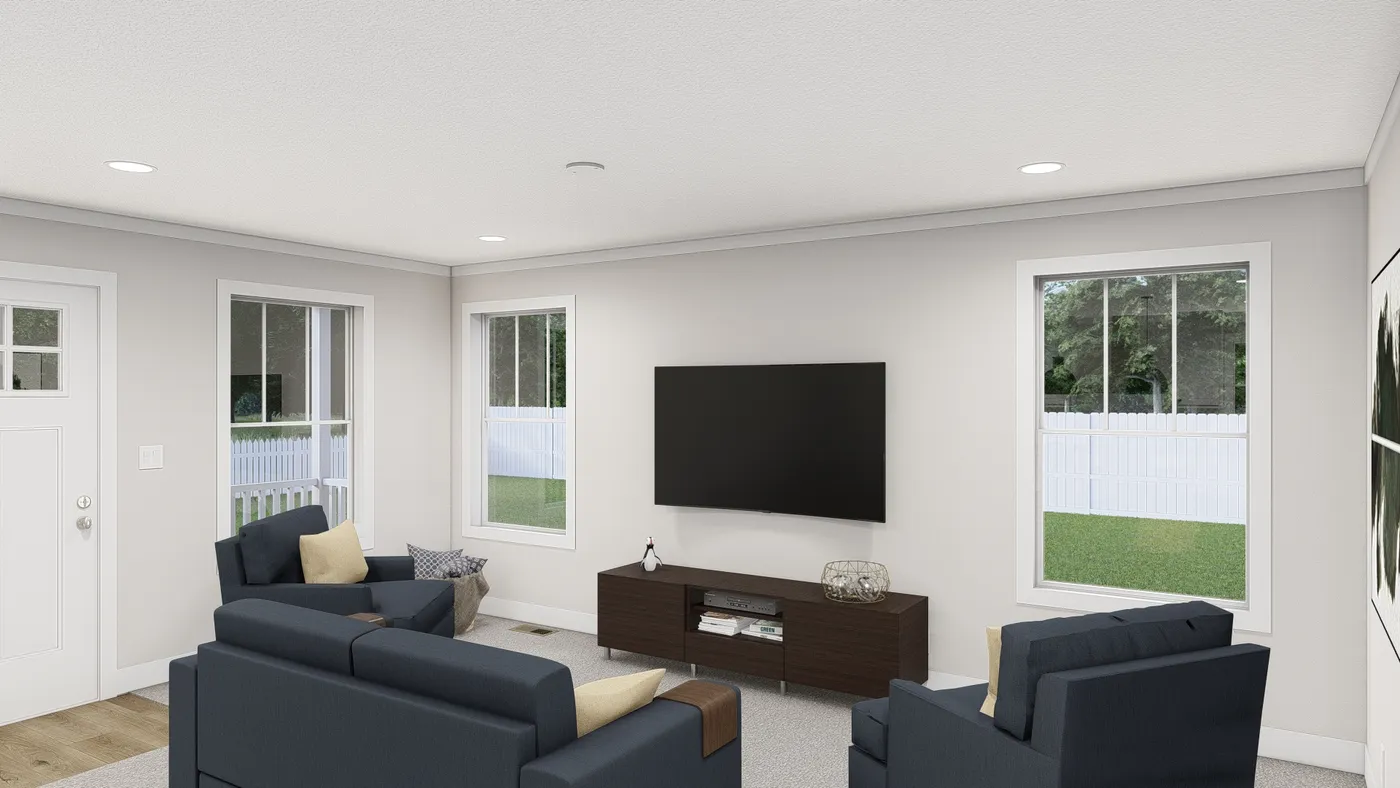 The WHOLE LOTTA LOVE Living Room. This Manufactured Mobile Home features 3 bedrooms and 2 baths.