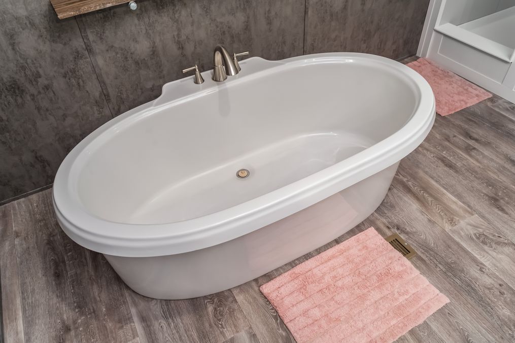 The THE FUSION 32B Primary Bathroom. This Manufactured Mobile Home features 4 bedrooms and 2 baths.