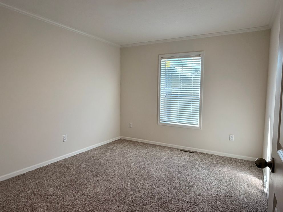 The TOURMALINE 7628-649 Guest Bedroom. This Manufactured Mobile Home features 4 bedrooms and 2 baths.